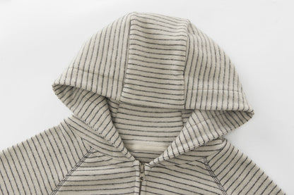 Raglan sleeves on a striped zip-up hoodie