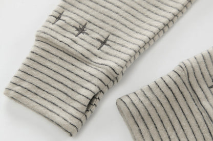 Striped hoodie styled as a relaxed everyday layer