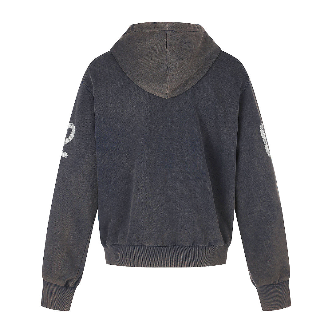 Side view of the graphic zip-up hoodie displaying its oversized boxy fit