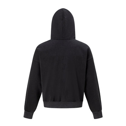 Close-up of the hoodie zip fastening and distressed graphic design