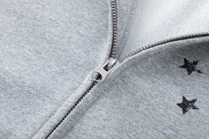 Detail of the sleeve and cuff on the distressed graphic hoodie