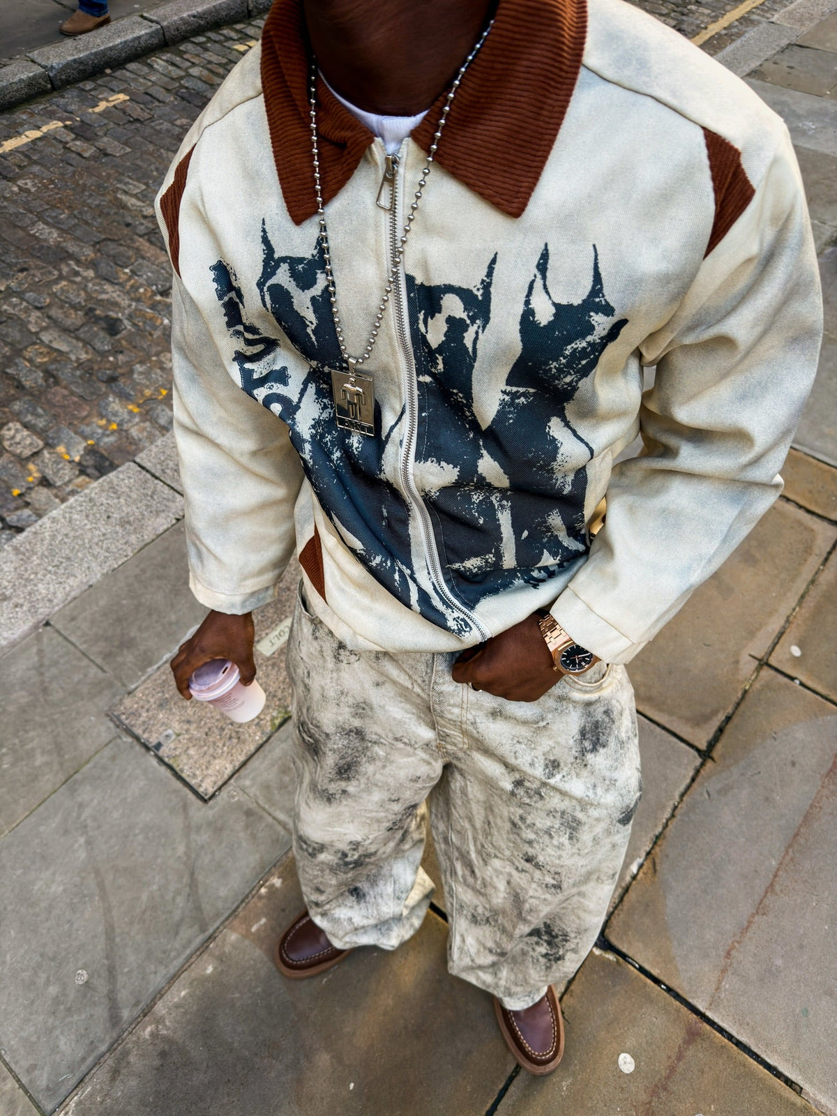 Side view of the relaxed-fit polyester streetwear jacket
