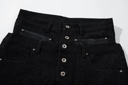 Close-up of the double waistband on barrel-leg jeans