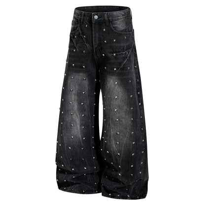 Waistband and belt loop detail on black baggy jeans
