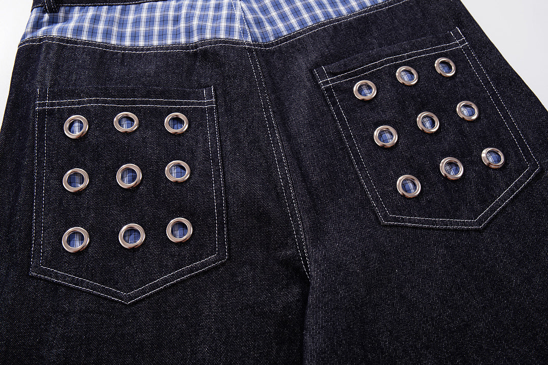 Waistband and front fastening detail on the baggy jeans