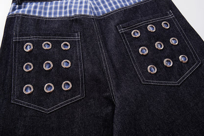 Waistband and front fastening detail on the baggy jeans