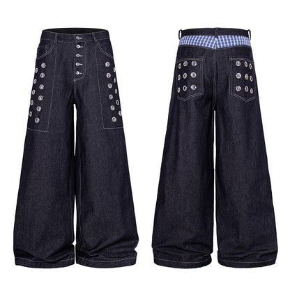 Close-up of the denim texture and stitching on the baggy jeans