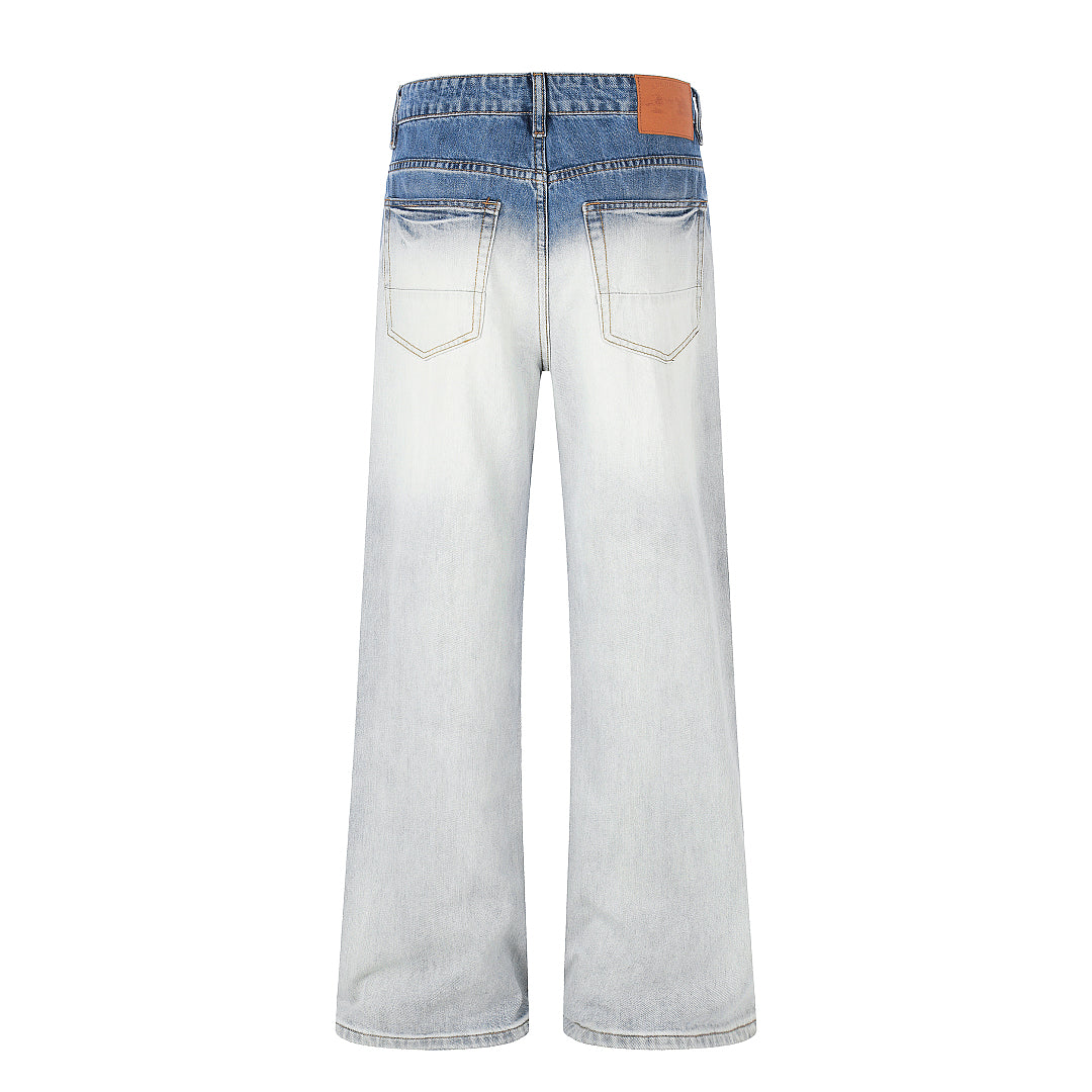 Side view showing the relaxed fit of gradient baggy jeans