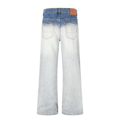 Side view showing the relaxed fit of gradient baggy jeans