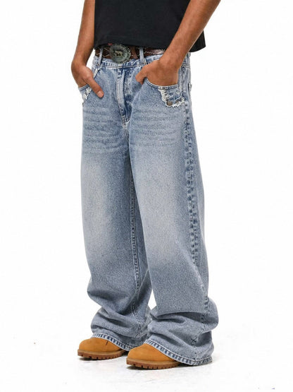 Baggy washed frayed jeans with a relaxed wide-leg silhouette