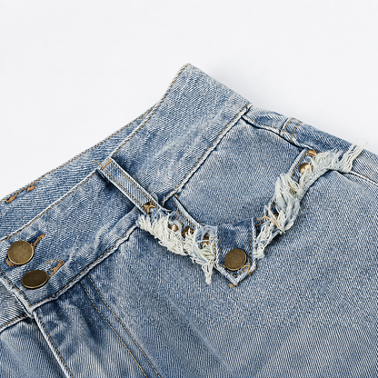 Side view of relaxed wide-leg jeans with a frayed finish