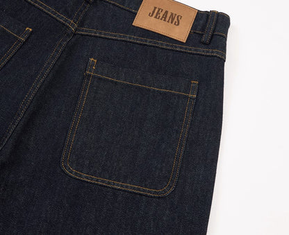 Styling detail of turn-up baggy jeans for a casual outfit