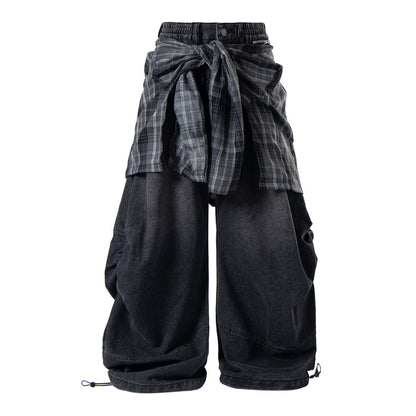 Baggy jeans showing the detachable plaid layer