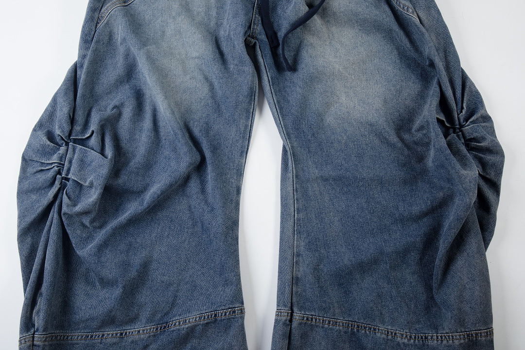 Close-up of the plaid layer on the jeans