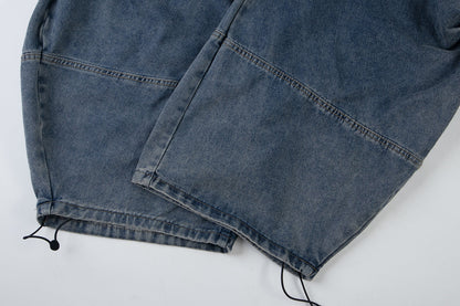 Waistband and front pockets on baggy jeans