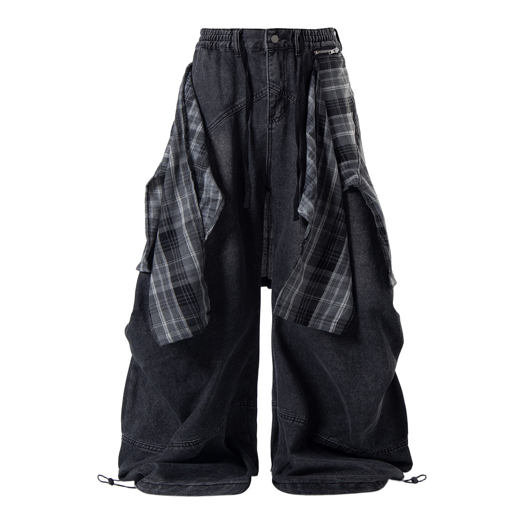 Plaid layer and wide-leg silhouette on jeans