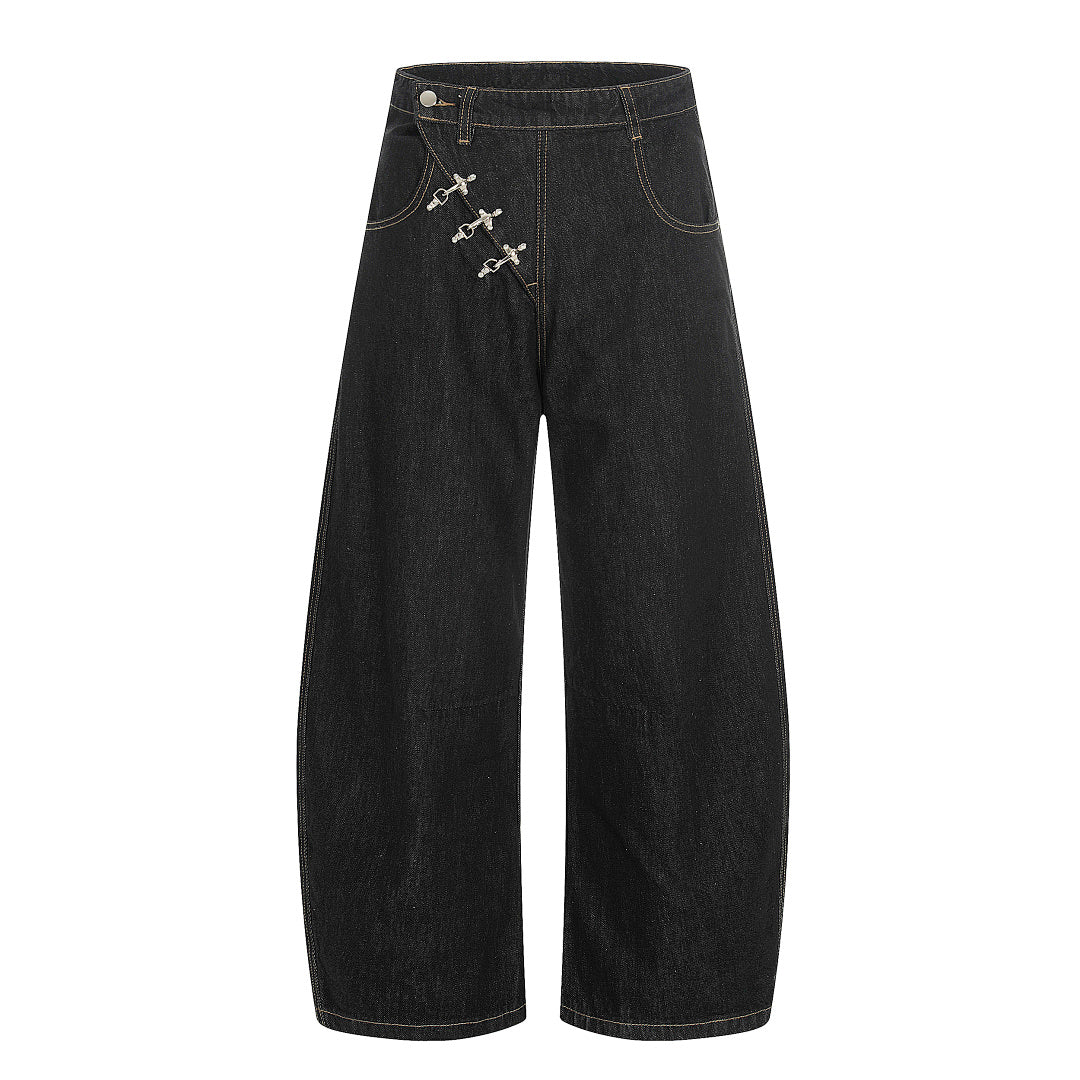 Front view of relaxed baggy jeans with distinctive fireman clasps