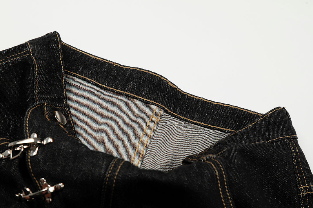 Full-length view of baggy jeans with statement clasp details