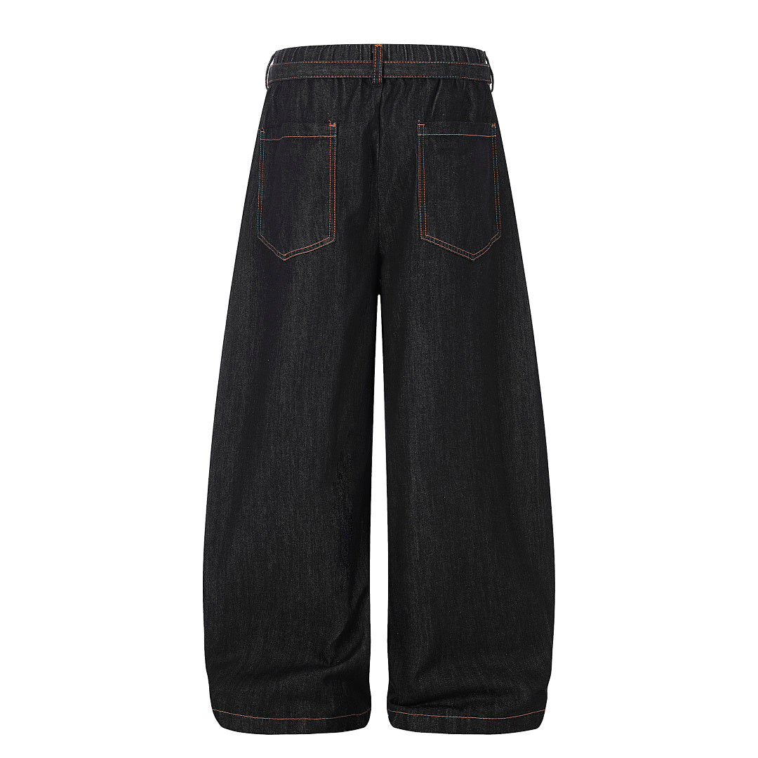 Back view of baggy barrel jeans with pleated detailing
