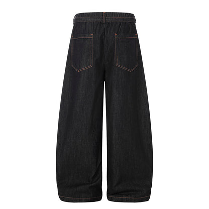 Back view of baggy barrel jeans with pleated detailing