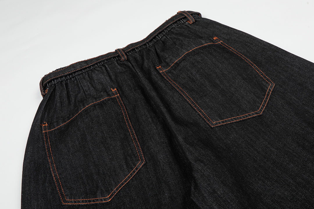 Full-length view of relaxed barrel-leg jeans