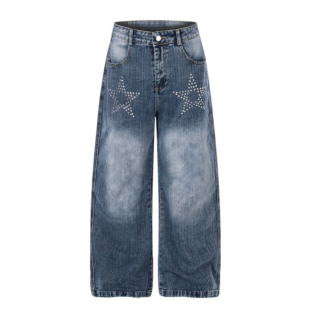 Close-up of rhinestone star detailing on baggy jeans