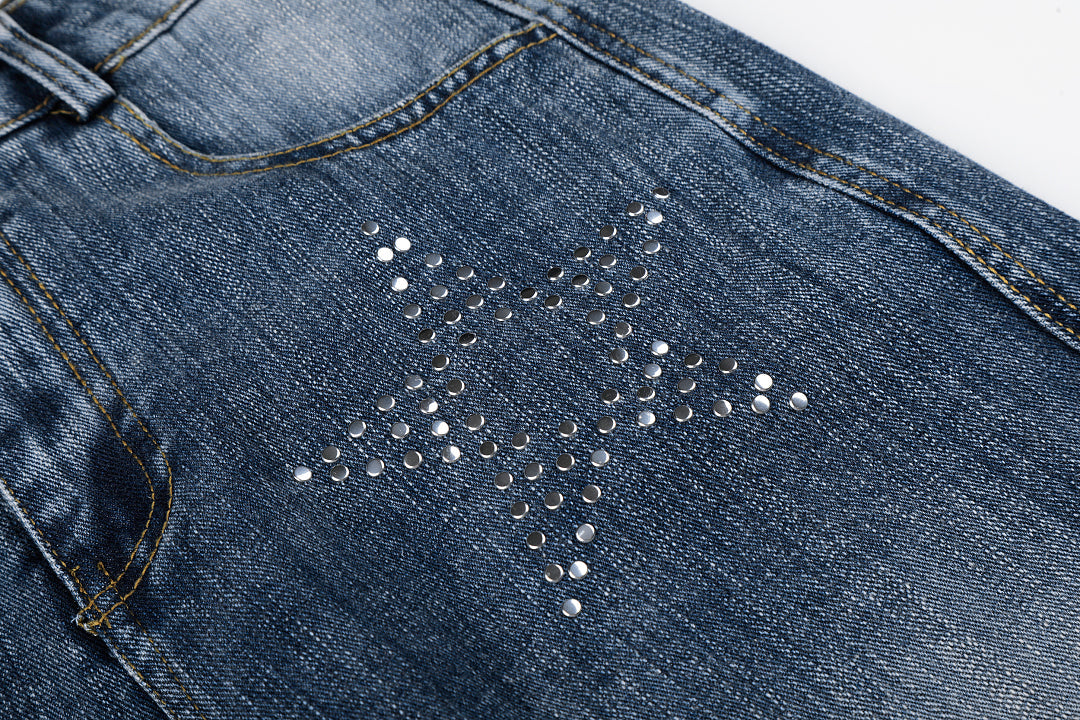 Waist and pocket detail on rhinestone star baggy jeans