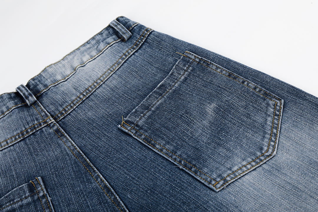 Rhinestone stars arranged across the leg of baggy jeans