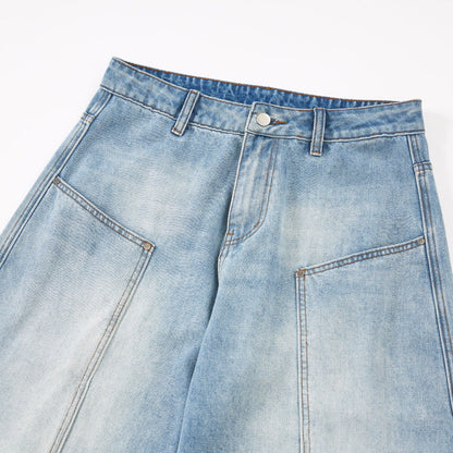 Close-up of the curved seam panels on the baggy barrel jeans