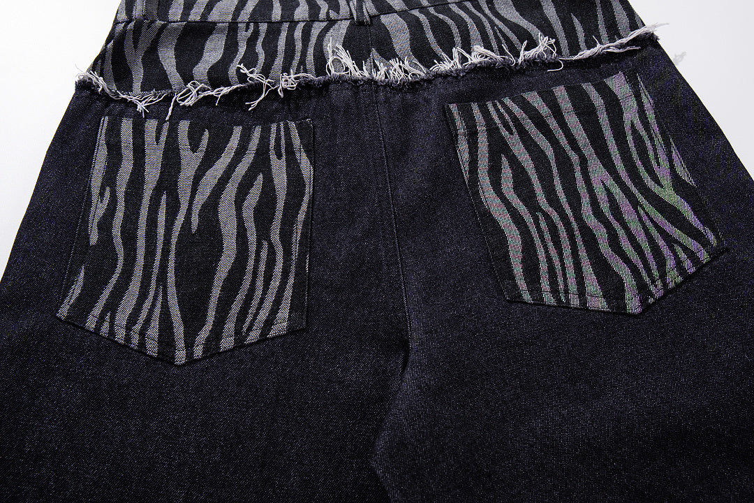 Waist detail showing the layered zebra design on the jeans