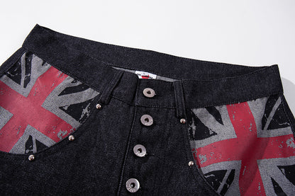 Close-up of the Union Jack pocket on dark denim jeans