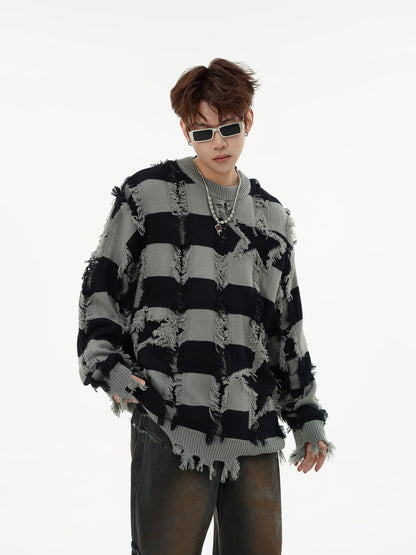 Sleeve and cuff detail on the oversized knit sweater