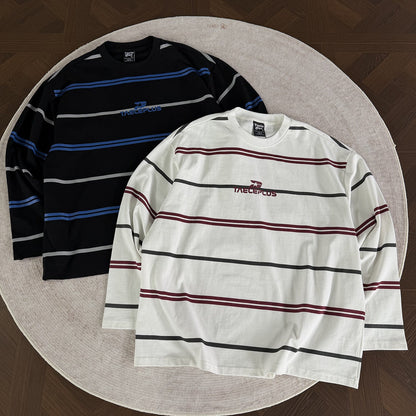 Two colour options of an oversized striped mock neck shirt
