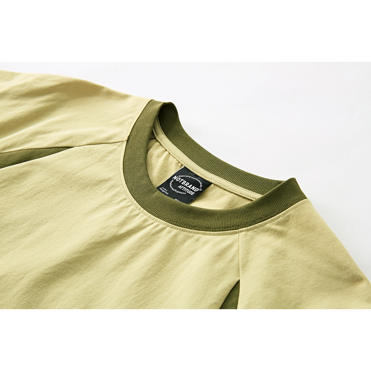 Three-quarter front view of contrast raglan graphic T-shirt