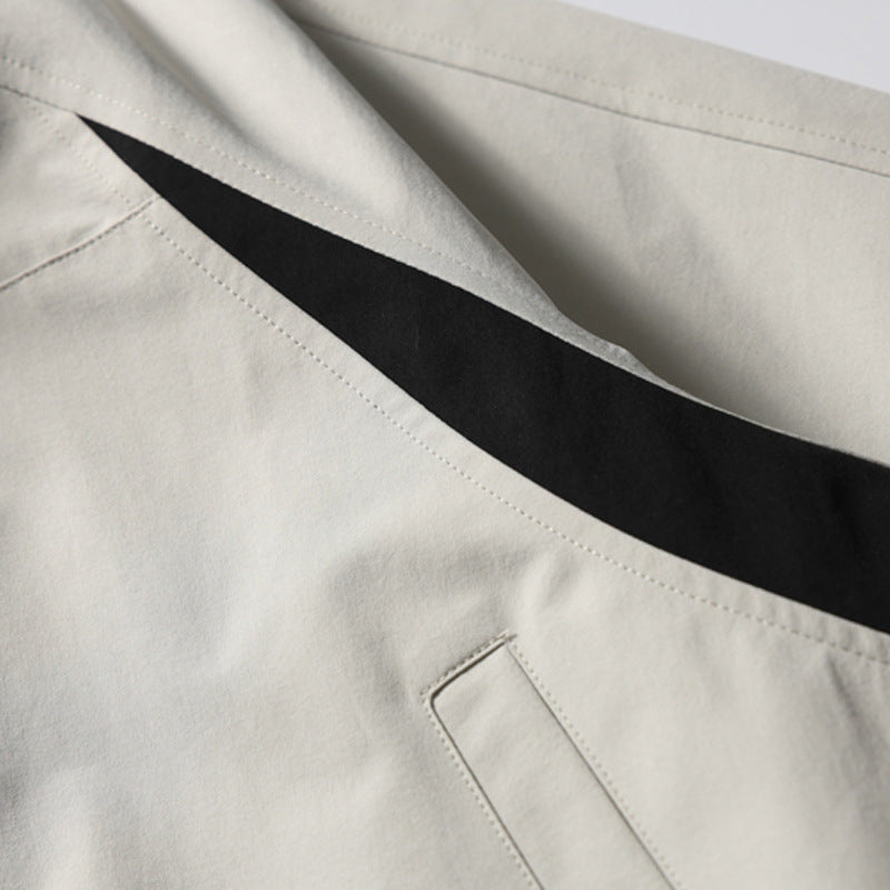 Black and white zip-up jacket suitable for training and leisure