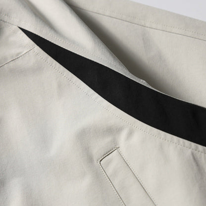 Black and white zip-up jacket suitable for training and leisure