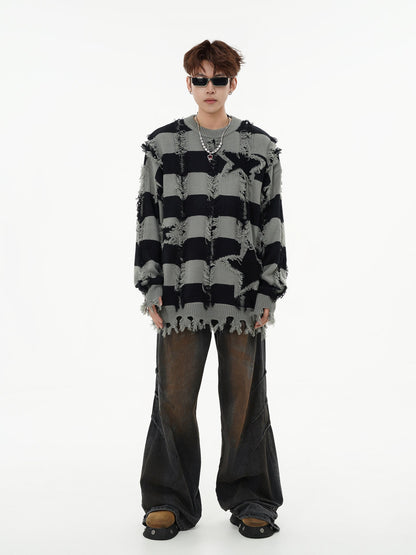 Side view of the oversized star stripe knit sweater