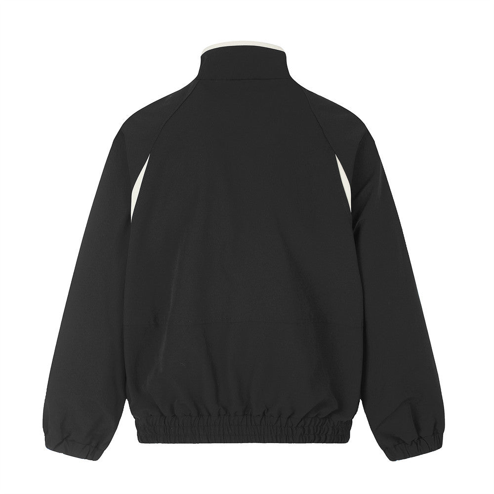 Black and white zip-up track jacket showing colourblock design