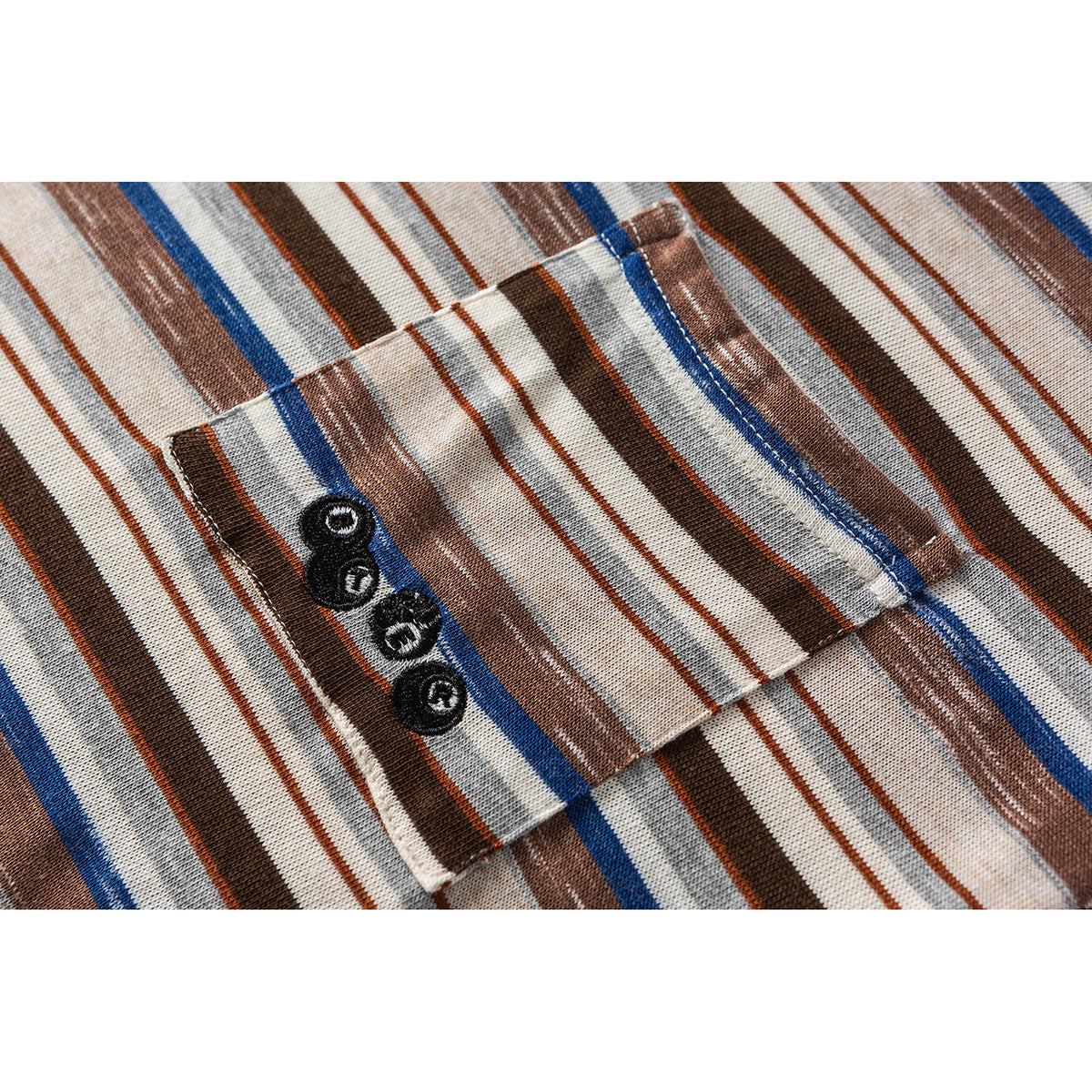 Close-up of crew neck, stripe pattern and pocket stitching on the tee