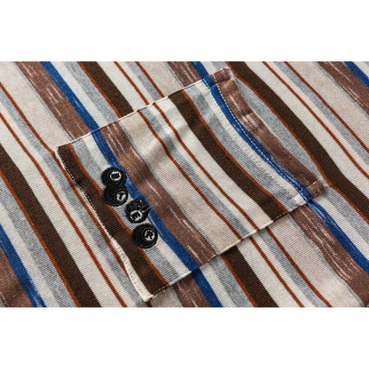 Close-up of crew neck, stripe pattern and pocket stitching on the tee