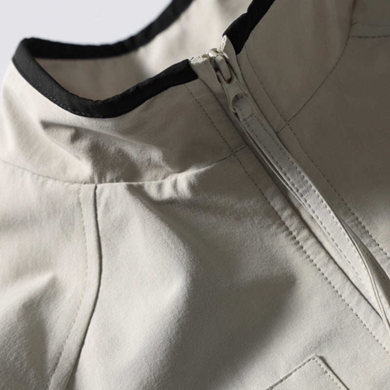 Black and white athletic jacket styled for casual everyday wear