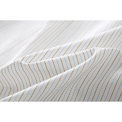Full-length view of the oversized striped button-down shirt outfit