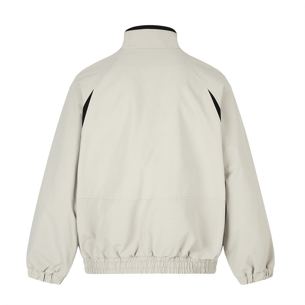 Black and white track jacket with long sleeves and stand collar