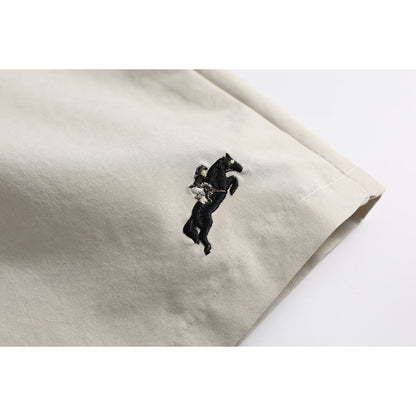 Relaxed fit cargo shorts shown on model from the back