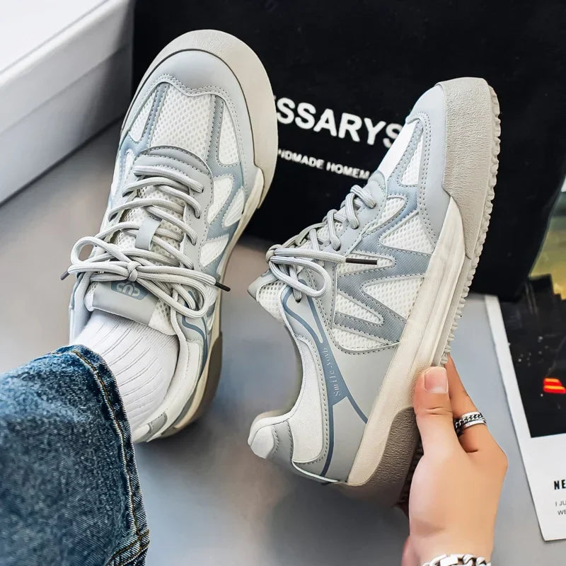 Pair of breathable board trainers viewed from above