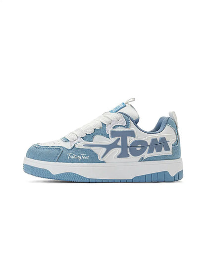 Side profile highlighting the low-top shape and lace-up fastening