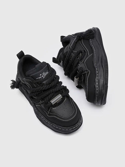 Detailed view of the upper on wavy sole sneakers