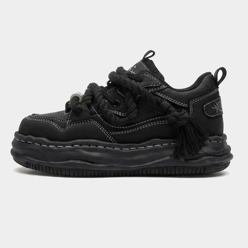 Chunky wavy sole sneakers shown from the side
