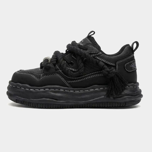 Chunky wavy sole sneakers shown from the side