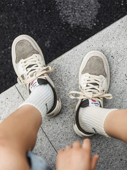 Close-up of suede panels on low top trainers